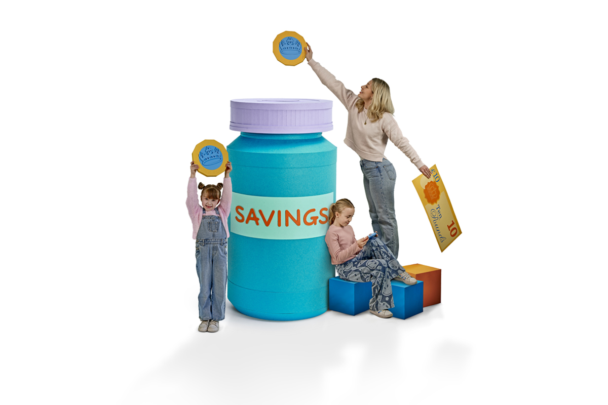 image of a woman and her children putting money away in a savings jar