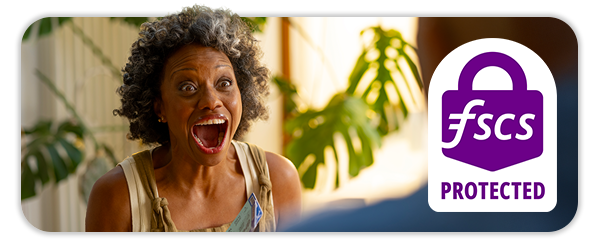 Close up image of a woman with a happy shocked face